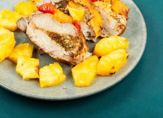 Свинина с ананасом и сыром в духовке